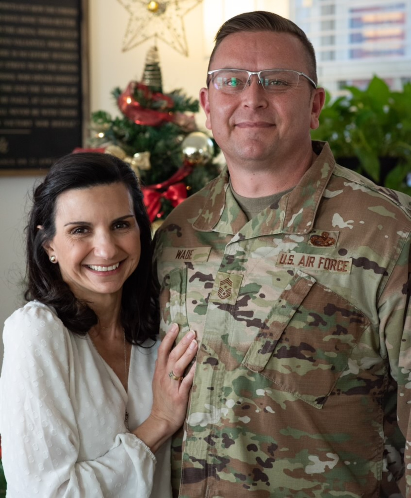 A photo of a couple smiling.