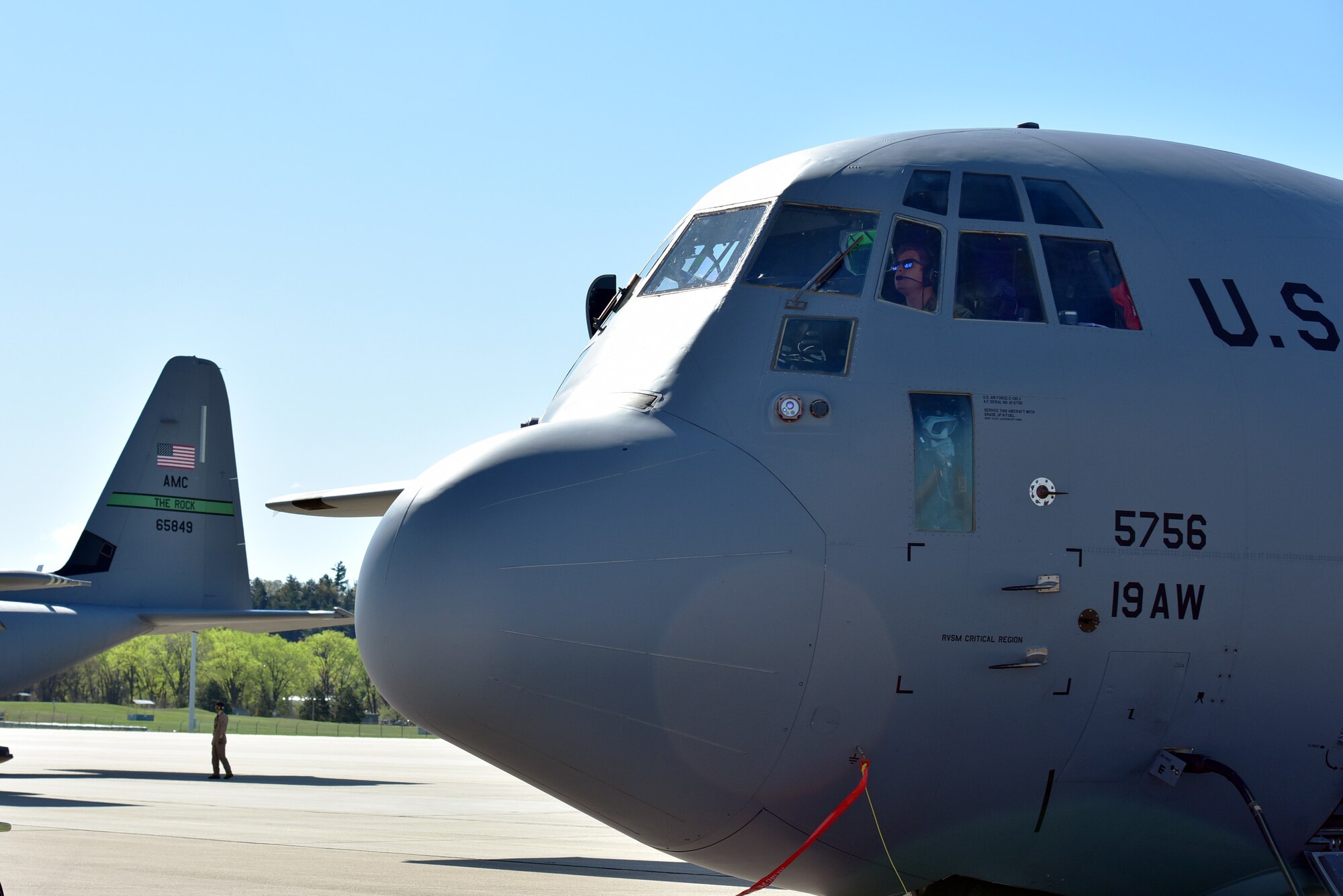 A pilot assigned to the 19th Airlift Wing prepares for takeoff in a C-130J Super Hercules