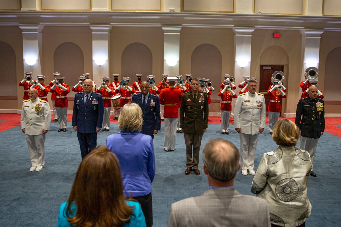 From left to right, Commandant of the U.S. Coast Guard Adm. Karl L. Schultz, Chief of Space Operations Gen. John W. "Jay" Raymond, Chief of Staff of the U.S. Air Force Gen. Charles Q. Brown, Jr., Chief of the National Guard Bureau Gen. Daniel R. Hokanson, Chief of Naval Operations Adm. Michael Gilday, and the 38th Commandant of the Marine Corps Gen. David H. Berger, stand for honors during the Friday Evening Parade at Marine Barracks Washington, D.C., May 7, 2021. The 38th Commandant of the Marine Corps Gen. David H. Berger hosted the ceremony, and the following service chiefs were the guests of honor: Chief of Naval Operations Adm. Michael Gilday, Chief of Space Operations Gen. John W. "Jay" Raymond, Chief of Staff of the U.S. Air Force Gen. Charles Q. Brown, Jr., Chief of the National Guard Bureau Gen. Daniel R. Hokanson, and Commandant of the U.S. Coast Guard Adm. Karl L. Schultz. (U.S. Marine Corps photo by Lance Cpl. Tanner D. Lambert)