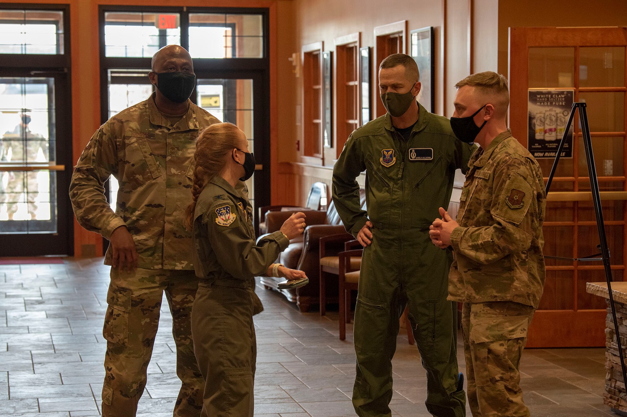 341st Missile Wing leadership speaks with Senior Airman Alexander Luttrell, 341st Contracting Squadron contract specialist, before the start of the Wing1Werx innovation competition April 16, 2021, at Malmstrom Air Force Base, Mont.