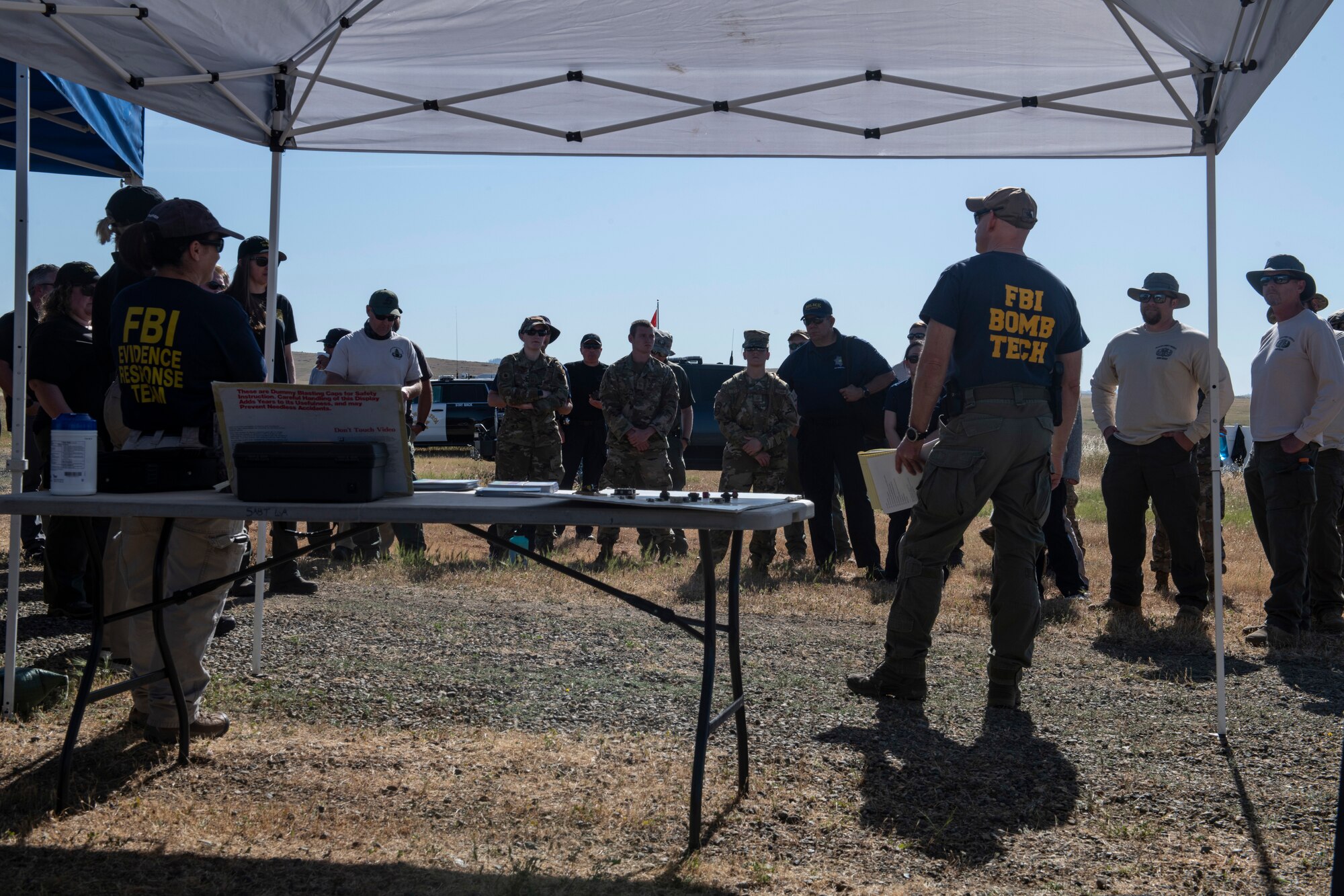 FBI bomb technicians teach Air Force and local law enforcement members about the history of vehicle-borne improvised explosive devices.