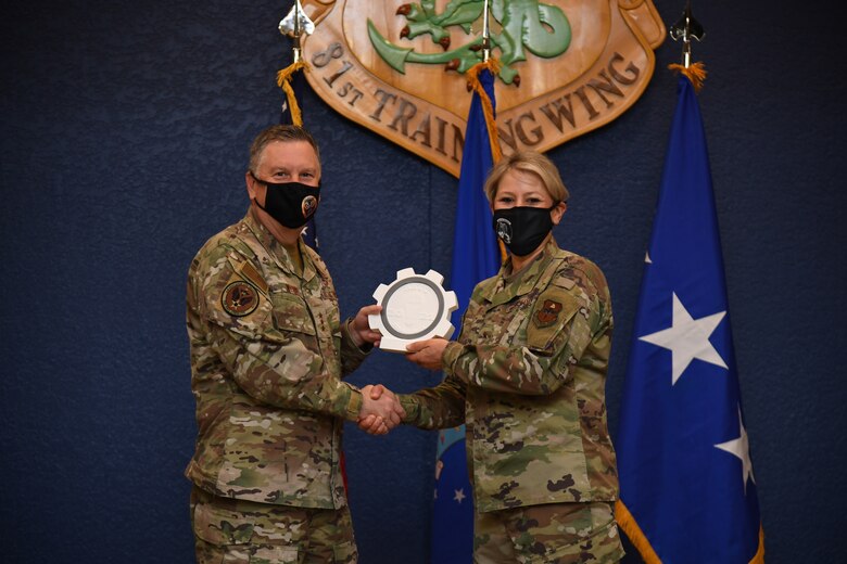 Winner receiving award from Lt. Gen. Webb