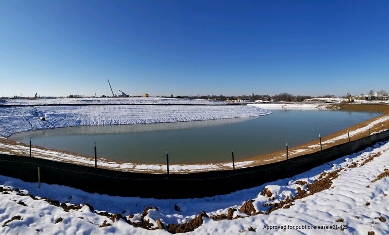 After the first snow of the year, a view of the north cooling pond at the N2W site in St. Louis, MO at the Next National Geospatial-Intelligence Agency West Headquarters site under construction in St. Louis, Mo. February 2, 2021. The building complex is expected to be occupied in 2025.