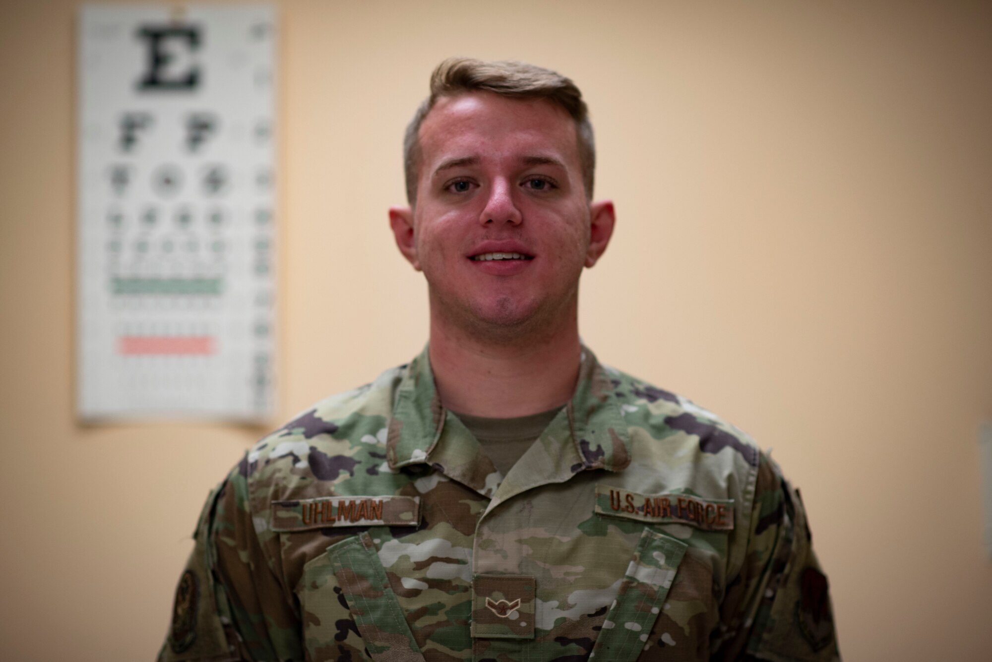 A photo on an Airman posing for a photo.