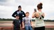 Capt. Katie Moorkamp, United States Air Force Air Demonstration Squadron, “Thunderbirds," executive officer, poses for a photo with kids visiting the 2021 Defenders of Liberty Air & Space Show at Barksdale Air Force Base, Louisiana, May 9, 2021. Barksdale's Air Show showcased performances from the Thunderbirds, F-22 Raptor Demonstration Team and a host of additional acts. (U.S. Air Force photo by Senior Airman Jacob B. Wrightsman)