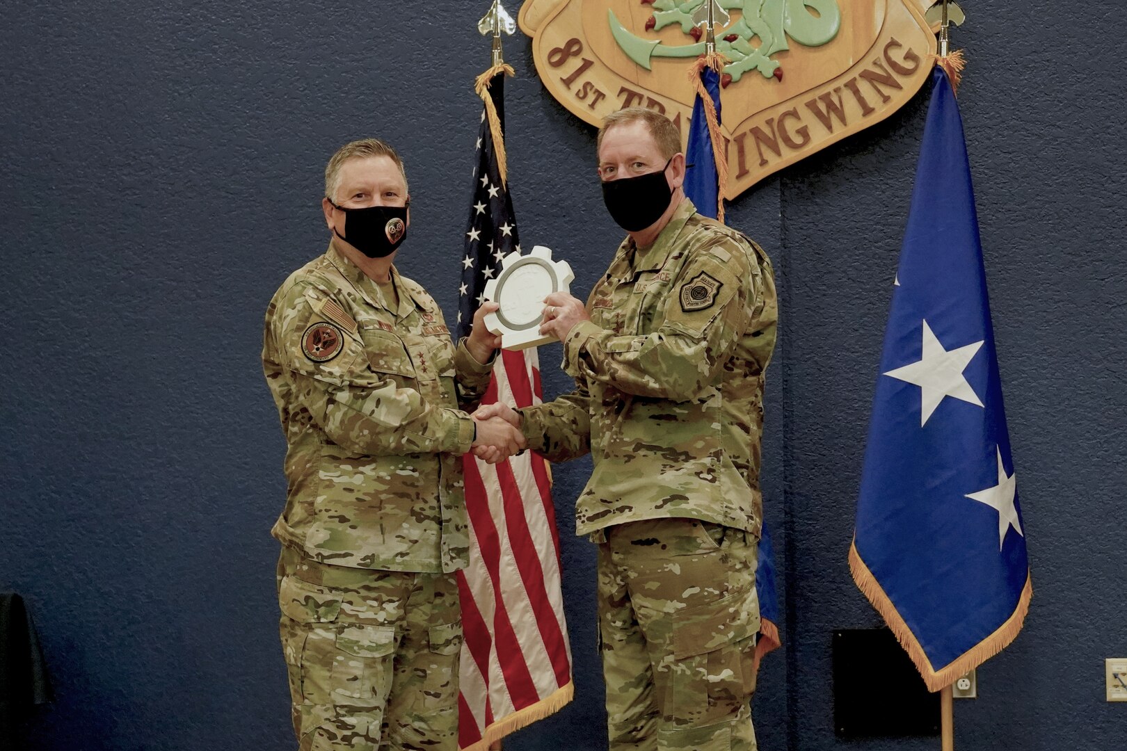 Winner receiving award from Lt. Gen. Webb