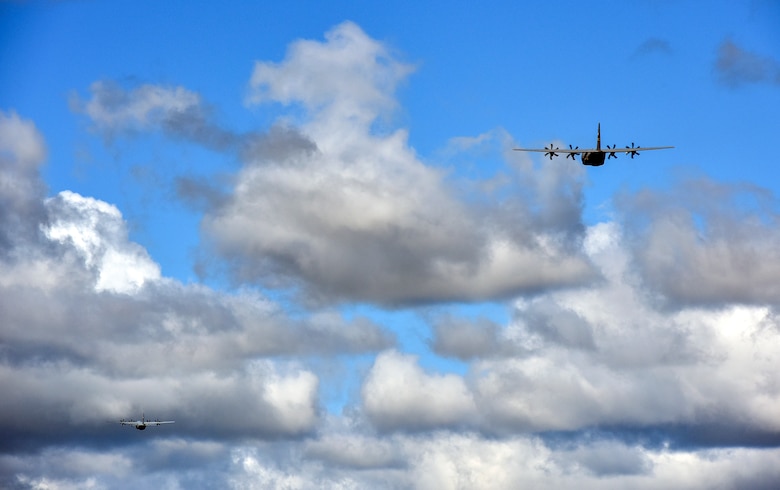Two C-130J Super Hercules assigned to the 19th Airlift Wing take off