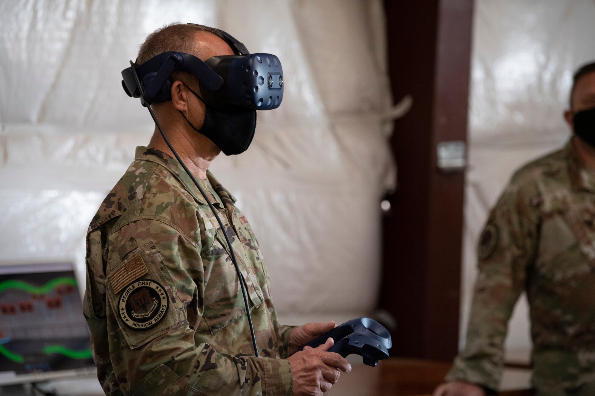 A photo of Gen. Kelly with a virtual reality headset on.