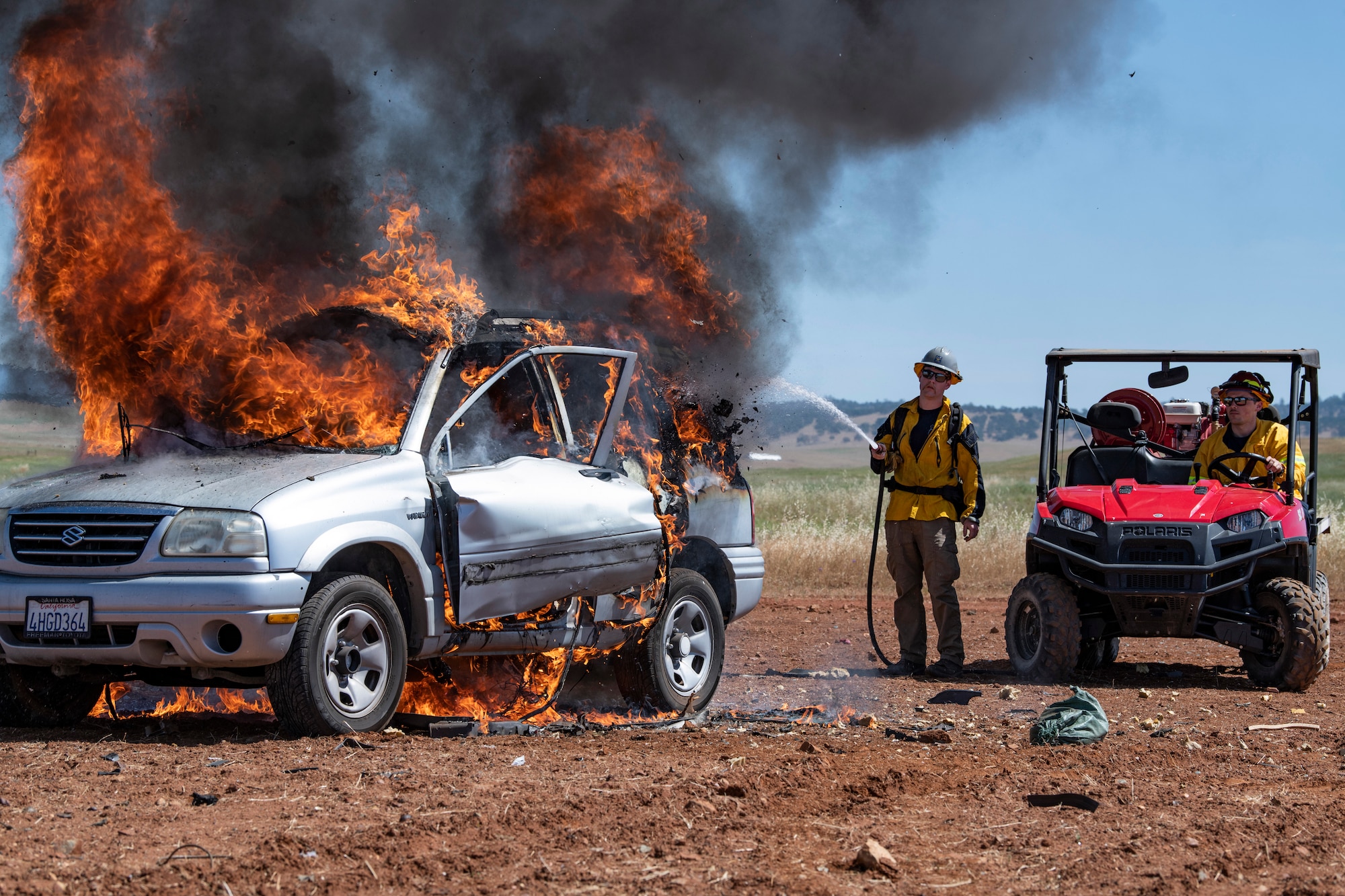 9th Civil Engineer Squadron firefighters extinguish a fire.