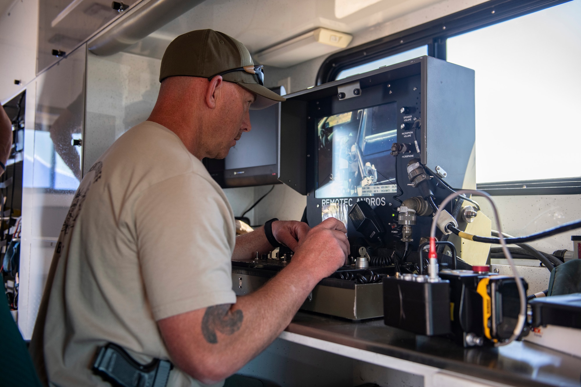 Tom McCue, Sacramento Sheriff's Office Explosive Ordnance Disposal (EOD) detective, operates a robot.