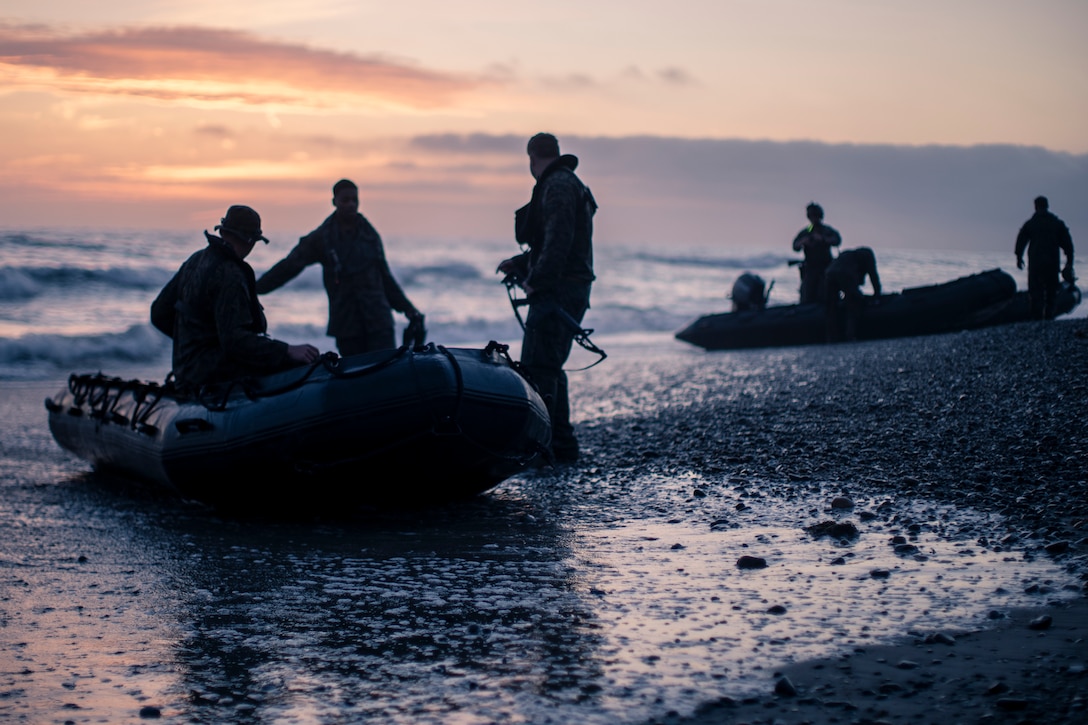 U.S. Marines with the All Domain Reconnaissance Detachment, 11th Marine Expeditionary Unit, load into combat rubber raiding craft during amphibious assault training at Marine Corps Base Camp Pendleton, Calif., April 7, 2021. The training was conducted to enhance amphibious landing capabilities using CRRCs and scout swimmers.