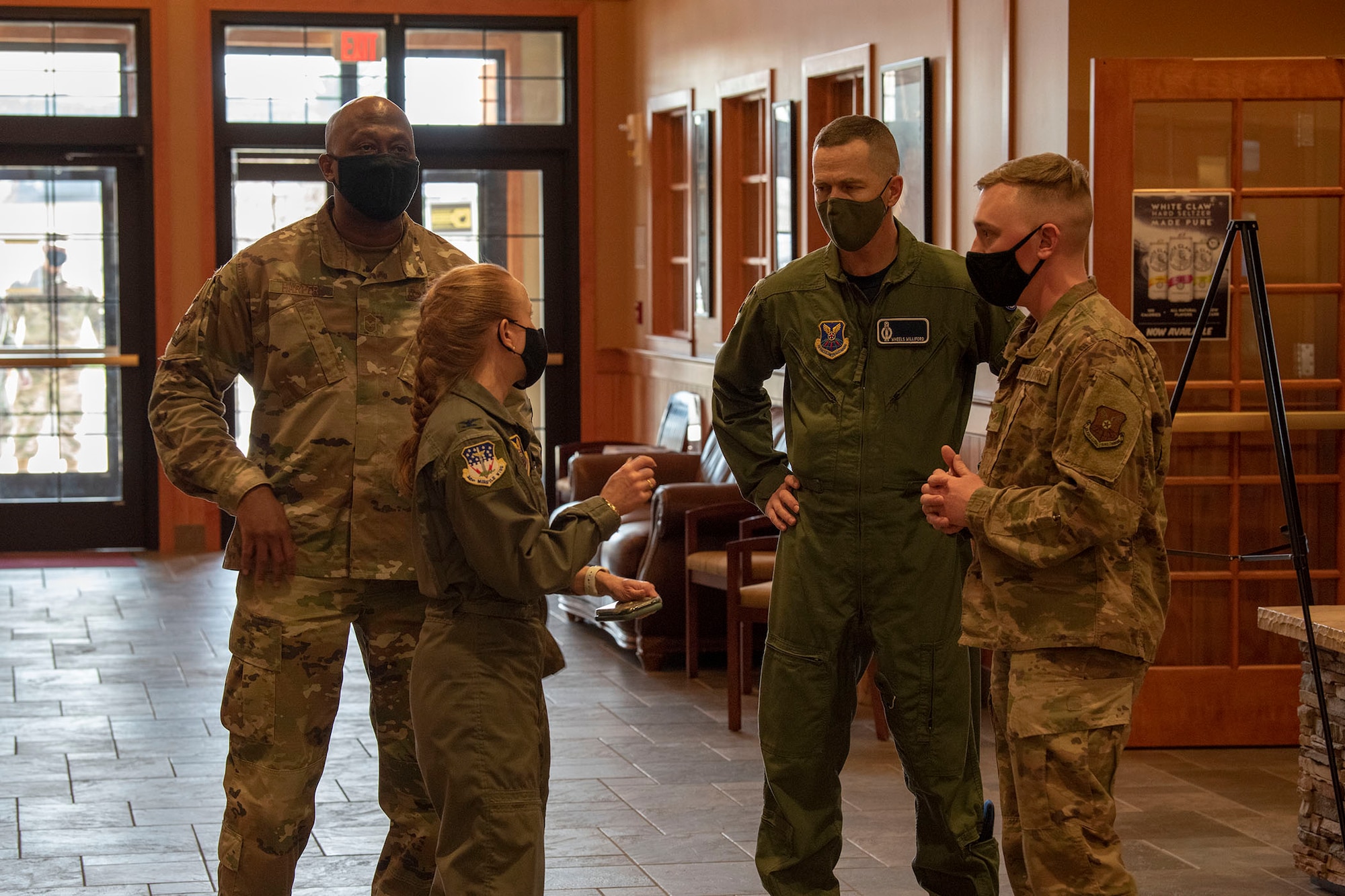 341st Missile Wing leadership speaks with Senior Airman Alexander Luttrell, 341st Contracting Squadron contract specialist, before the start of the Wing1Werx innovation competition April 16, 2021, at Malmstrom Air Force Base, Mont.