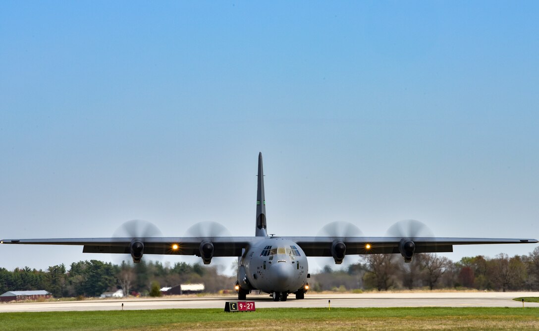 A C-130J Super Hercules assigned to the 19th Airlift Wing taxis on the flightline