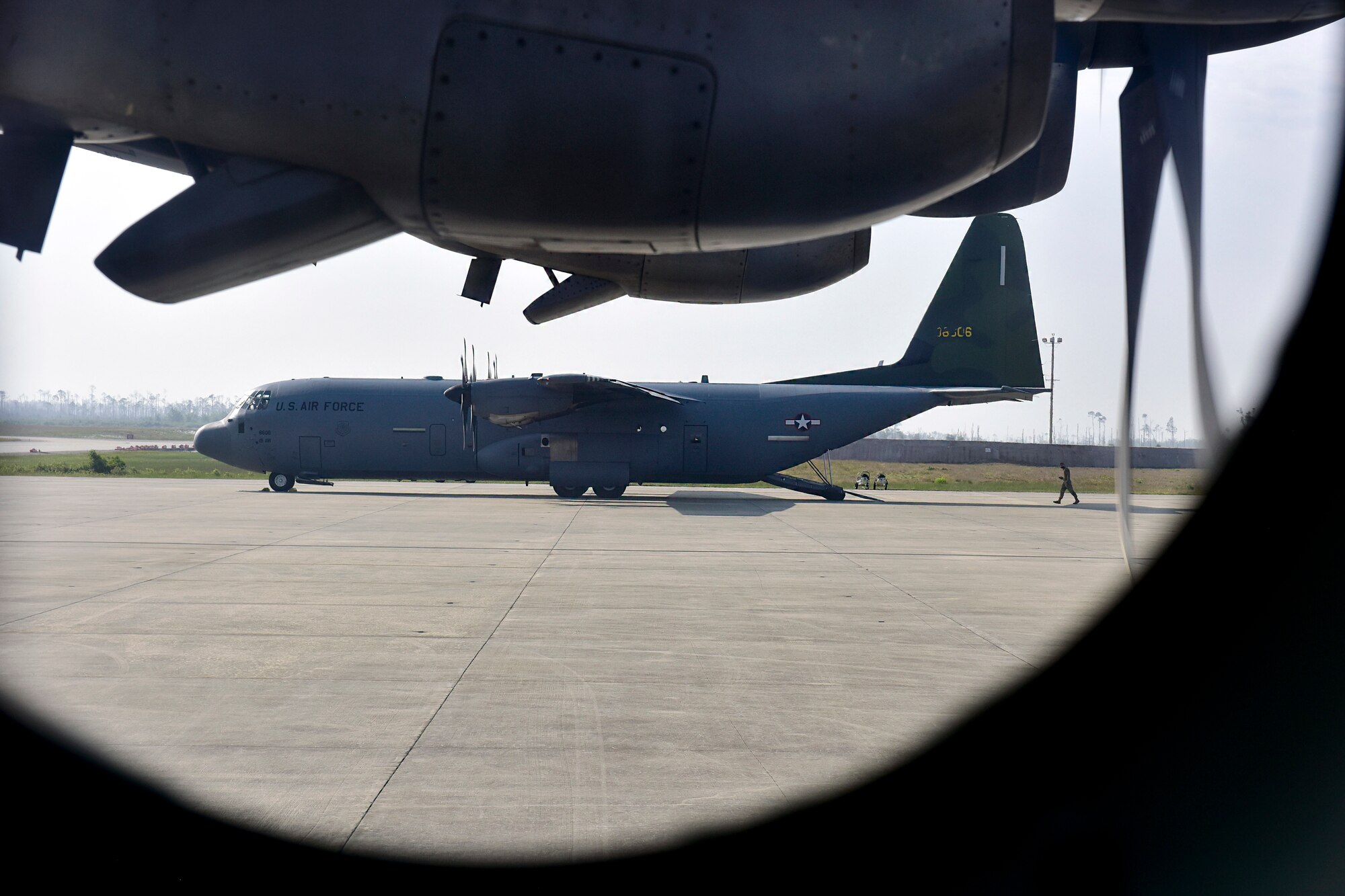 A C-130J Super Hercules assigned to the 19th Airlift Wing is offloaded on the flightline