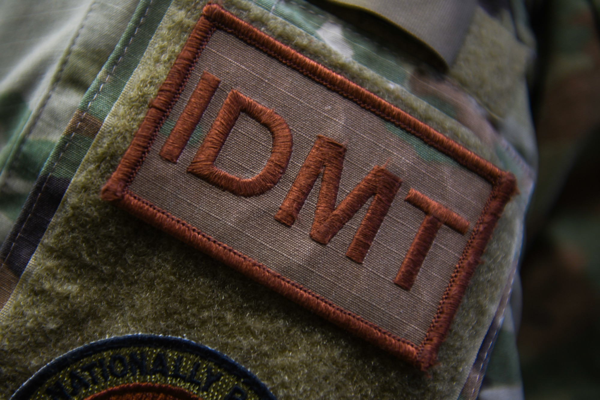 Tech. Sgt. Kimberly Weaver, 606th Air Control Squadron noncommissioned officer in charge of medical readiness, wears an Independent Duty Medical Technician patch at Aviano Air Base, Italy, May 10, 2021. Independent Duty Medical Technicians are the only enlisted healthcare provider who can give care in the absence of a licensed, privileged or credentialed health care provider. (U.S. Air Force photo by Senior Airman Ericka A. Woolever)