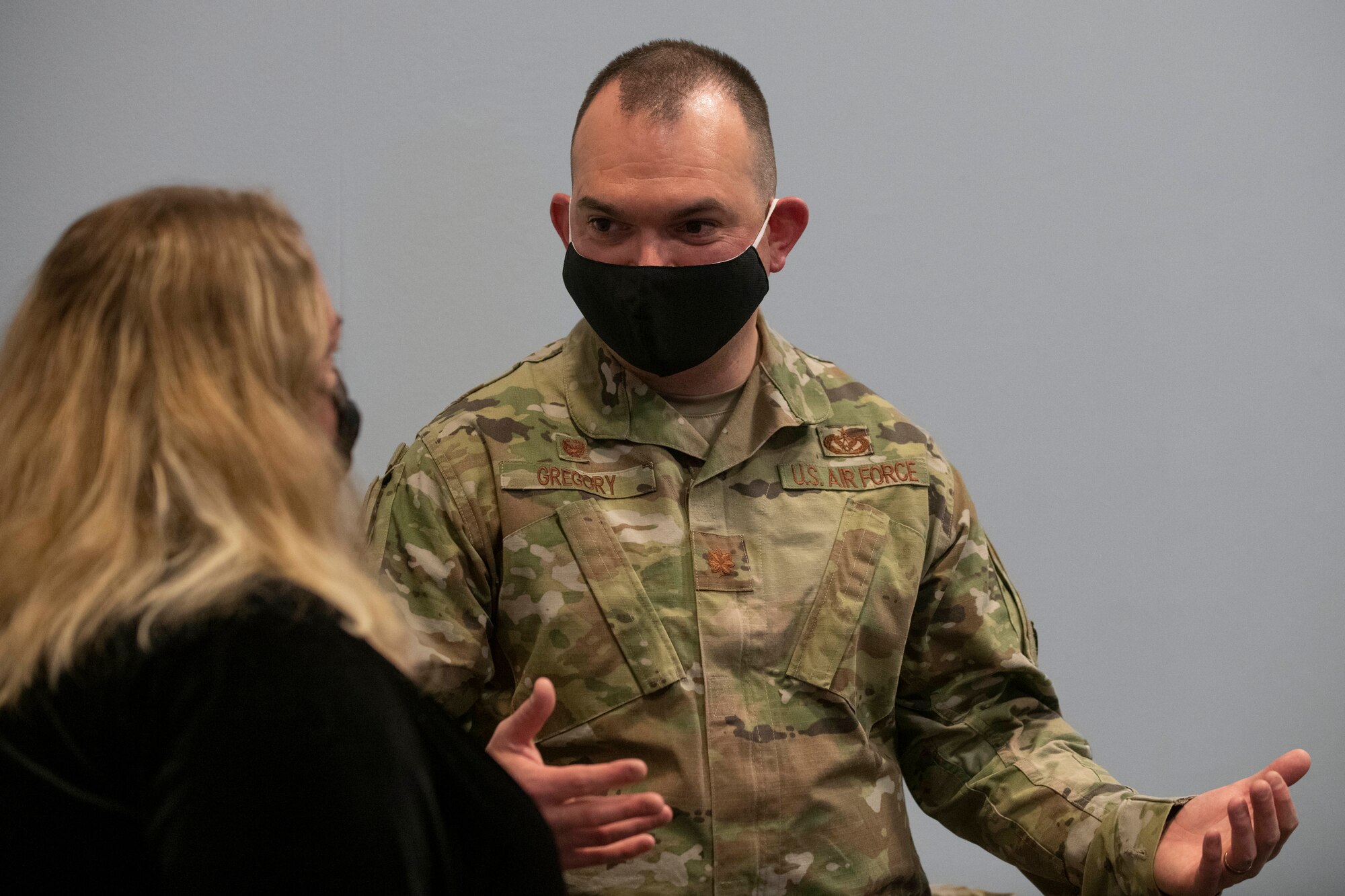 U.S. Air Force Maj. Derek Gregory, right, 422nd Civil Engineer Squadron commander, speaks with Tiffany Patrick, left, 501st Combat Support Wing plans, programs and strategy acting chief, at the Pathfinder Innovation Conference 2021 at Royal Air Force Croughton, England, May 6, 2021. The 501st CSW hosted its first innovation conference to highlight new ideas and promote a culture of innovation within the wing. (U.S. Air Force photo by Senior Airman Jennifer Zima)
