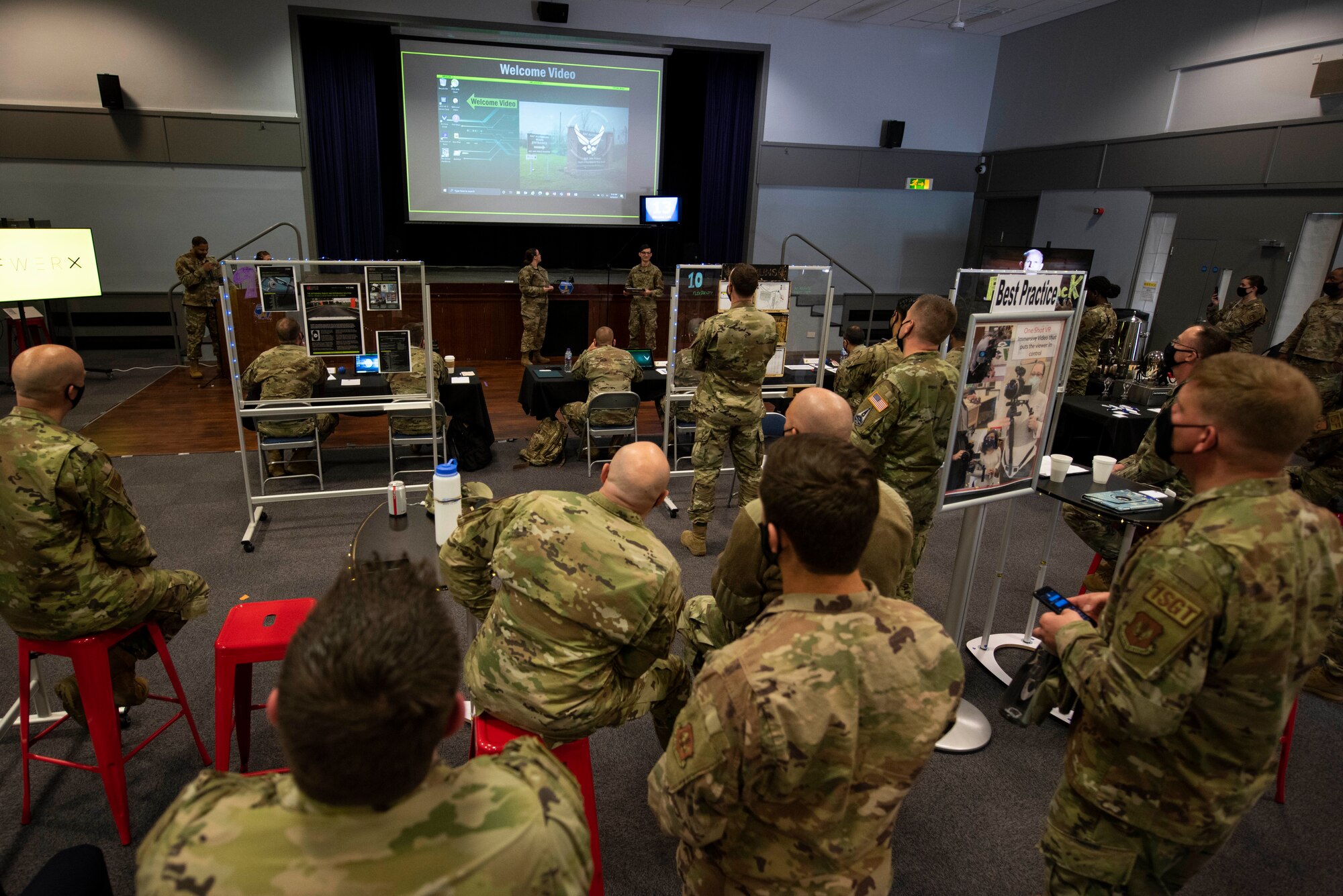 U.S. Air. Force Tech. Sgt. Kelsey Huffman, left, 423rd Force Support Squadron commander’s support staff noncommissioned officer in charge of commander support staff, and Senior Airman Tyler McGuigan, right, 423rd Communications Squadron client systems technician, present their team’s innovation project during Pathfinder Shark Tank at the Pathfinder Innovation Conference 2021 at Royal Air Force Croughton, England, May 6, 2021. The 501st Combat Support Wing hosted its first innovation conference to highlight new ideas and promote a culture of innovation within the wing. (U.S. Air Force photo by Senior Airman Jennifer Zima)