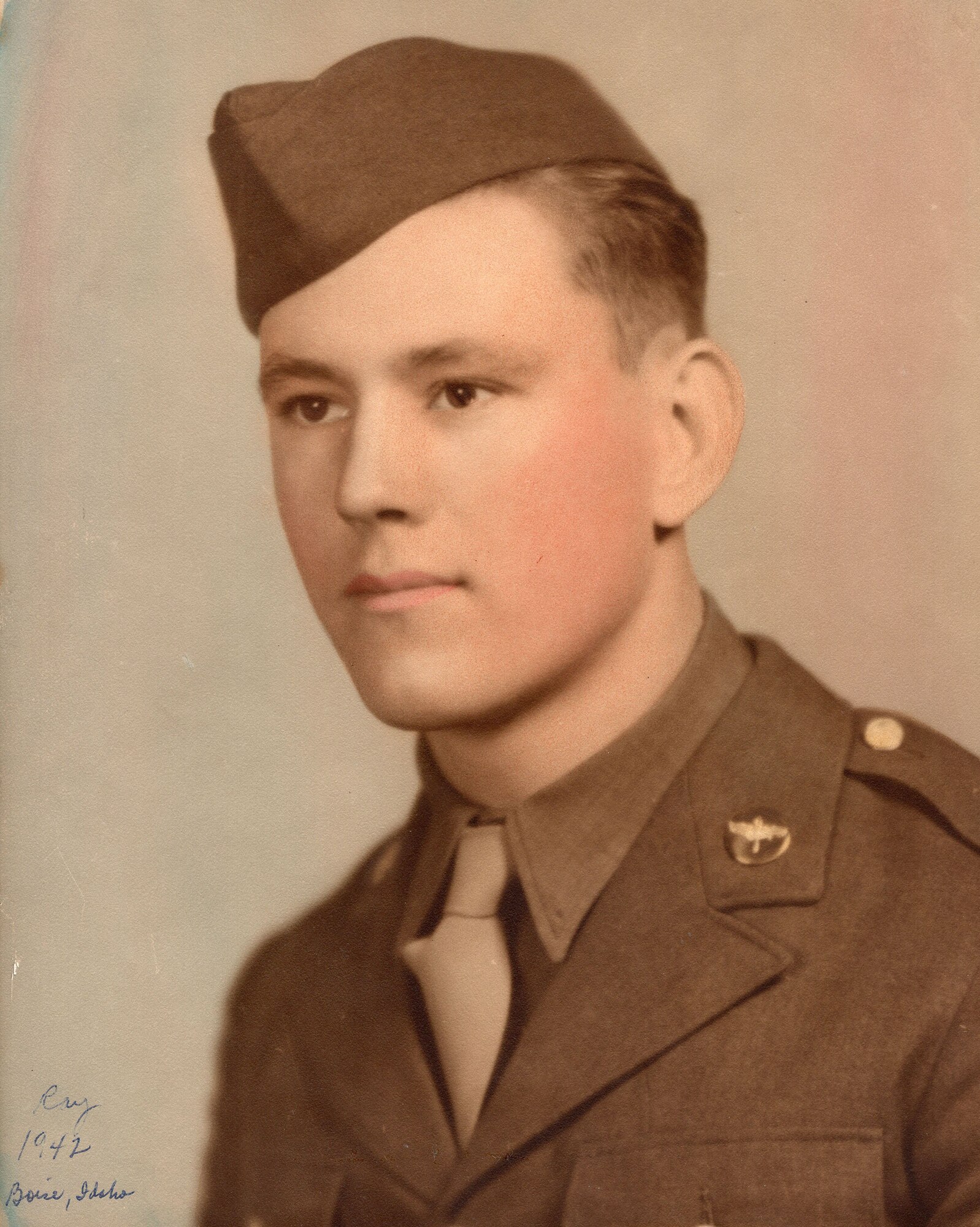 Dewey Christopher, retired master sergeant and veteran of World War II, the 100th Bombardment Group and 351st Bomb Squadron, poses for his official photo in his Class A uniform in 1942. Christopher was a crew chief with the 100th BG and 351st BS at Thorpe Abbotts, Diss, England, during World War II. During his time as a crew chief and maintainer on B-17 Flying Fortress aircraft, he worked on “Skipper” and “Skipper II.” One of Royal Air Force Mildenhall’s KC-135 Stratotanker aircraft was renamed “Skipper III” in Christopher’s honor May 7, 2021. (Courtesy photo)