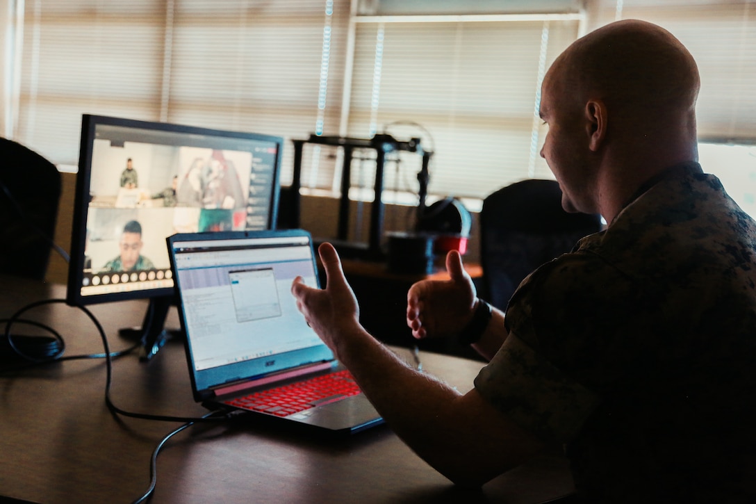 U.S. Marine Warrant Officer Zachary DeLong, a defensive cyber weapons officer with 7th Communication Bn., III Marine Expeditionary Force Information Group, demonstrates Defensive Cyberspace Operations-Internal Defensive Measures capabilities during a virtual training session with members of the Philippine Marine Corps on Camp Hansen, Okinawa, Japan, April 19, 2021. The training was conducted to contribute to continuous allyship expansion in the Indo-Pacific region, while simultaneously strengthening cyberspace capabilities in the III MEF area of operations.