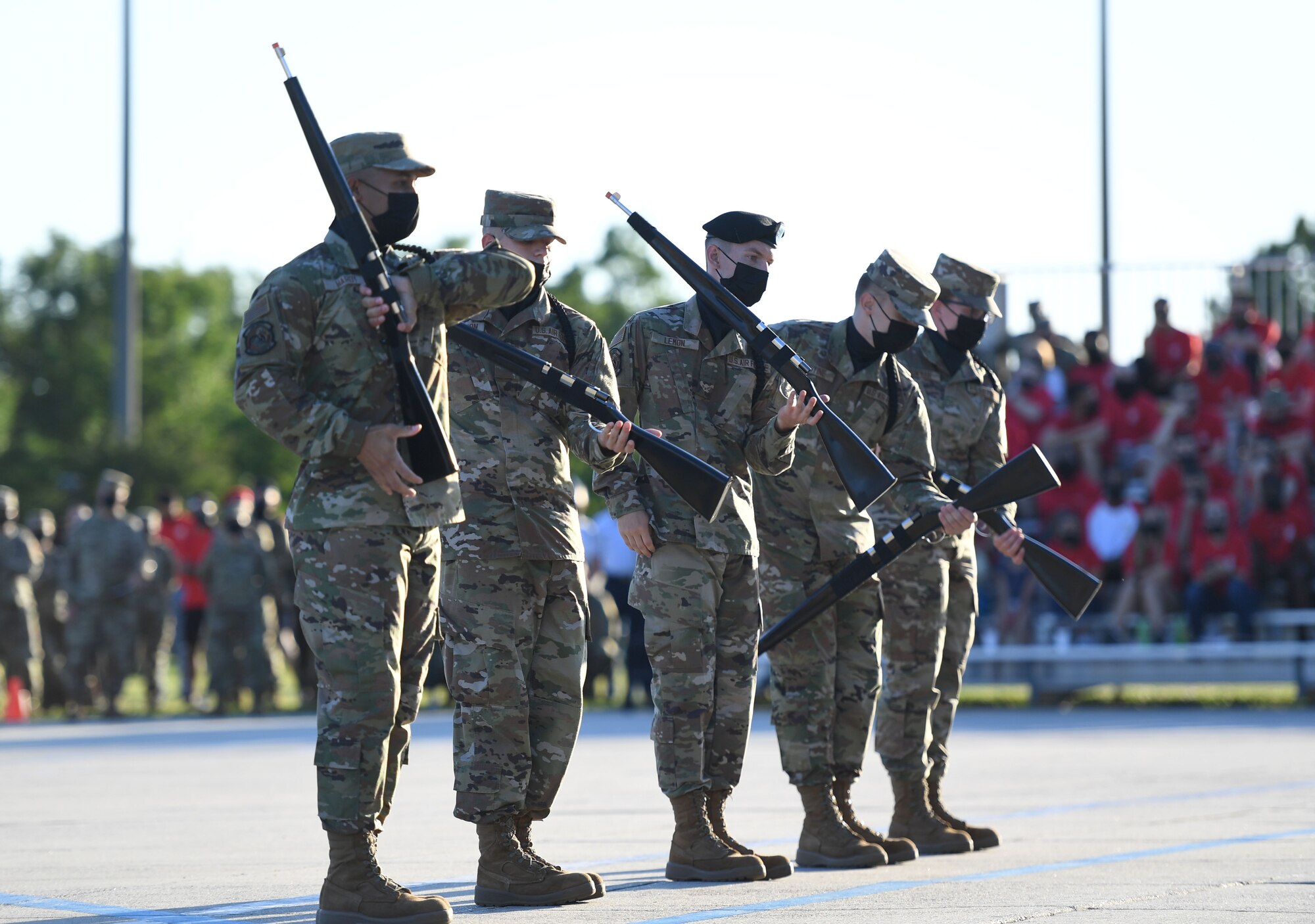 Members of the 338th Training Squadron freestyle drill team performs during the 81st Training Group drill down on the Levitow Training Support Facility drill pad at Keesler Air Force Base, Mississippi, May 6, 2021. Airmen from the 81st TRG competed in a quarterly open ranks inspection, regulation drill routine and freestyle drill routine. While in training, Airmen are given the opportunity to volunteer to learn and execute drill down routines. (U.S. Air Force photo by Kemberly Groue)