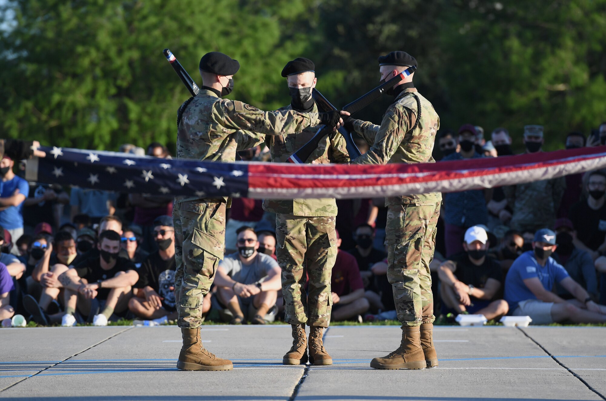 Members of the 336th Training Squadron freestyle drill team performs during the 81st Training Group drill down on the Levitow Training Support Facility drill pad at Keesler Air Force Base, Mississippi, May 6, 2021. Airmen from the 81st TRG competed in a quarterly open ranks inspection, regulation drill routine and freestyle drill routine. While in training, Airmen are given the opportunity to volunteer to learn and execute drill down routines. (U.S. Air Force photo by Kemberly Groue)