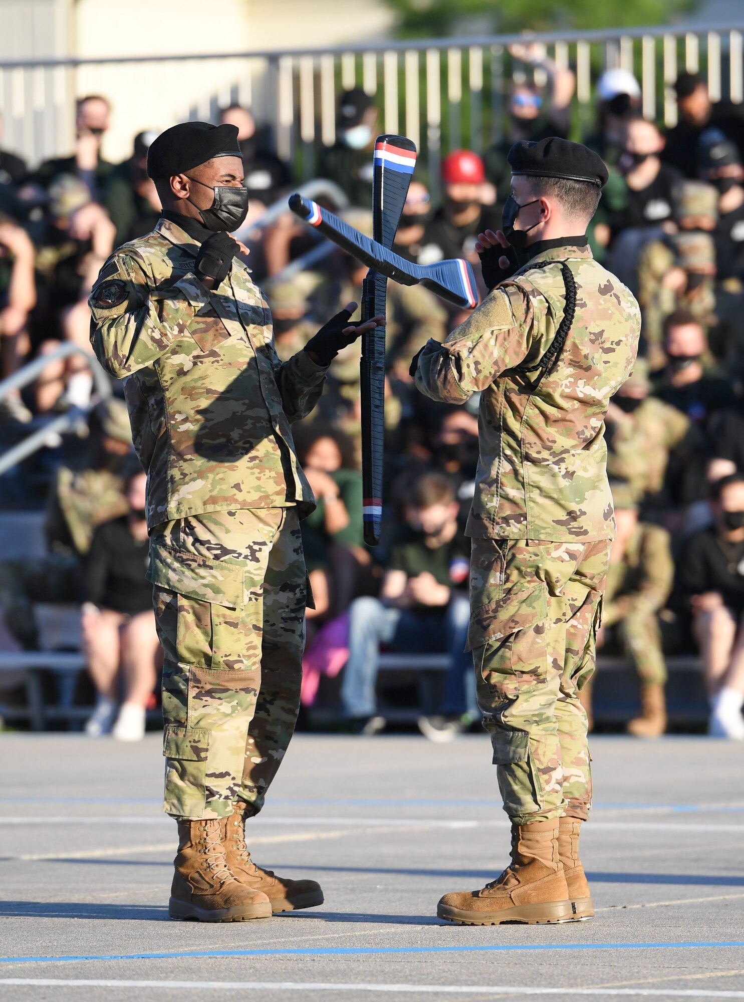 Members of the 336th Training Squadron freestyle drill team performs during the 81st Training Group drill down on the Levitow Training Support Facility drill pad at Keesler Air Force Base, Mississippi, May 6, 2021. Airmen from the 81st TRG competed in a quarterly open ranks inspection, regulation drill routine and freestyle drill routine. While in training, Airmen are given the opportunity to volunteer to learn and execute drill down routines. (U.S. Air Force photo by Kemberly Groue)