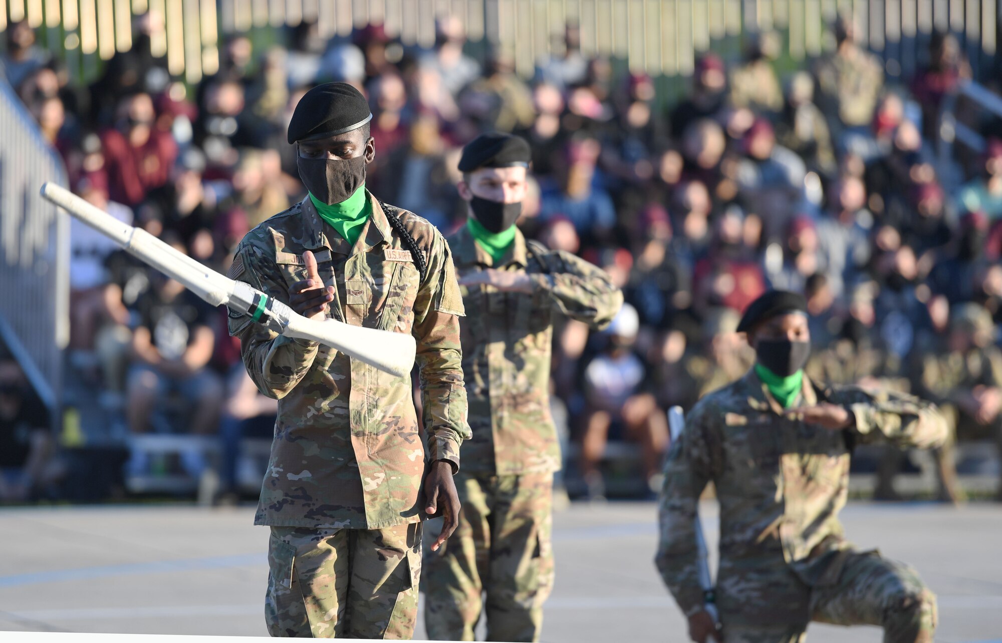 Members of the 334th Training Squadron freestyle drill team performs during the 81st Training Group drill down on the Levitow Training Support Facility drill pad at Keesler Air Force Base, Mississippi, May 6, 2021. Airmen from the 81st TRG competed in a quarterly open ranks inspection, regulation drill routine and freestyle drill routine. While in training, Airmen are given the opportunity to volunteer to learn and execute drill down routines. (U.S. Air Force photo by Kemberly Groue)