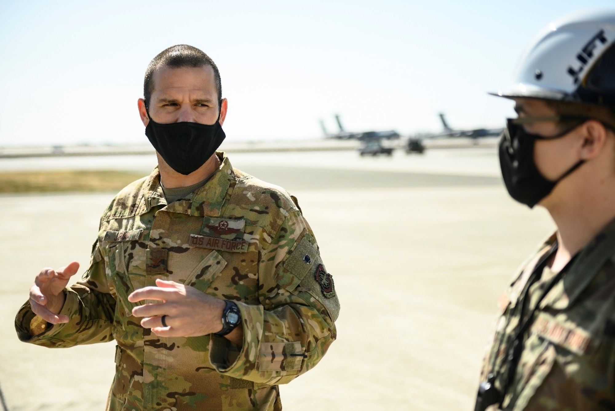 U.S. Air Force Col. Zachery Jiron, left, 60th Air Mobility Wing vice commander, speaks with Staff Sgt. Nikolas Darragh, 60th Maintenance Squadron assistant noncommissioned officer in charge of wheels and tires, May 7, 2021, at Travis Air Force Base, California. Jiron visited the 60th MXS during Leadership Rounds, a program that provides 60th AMW leadership an opportunity to interact with Airmen and receive a detailed view of each mission performed at Travis AFB.