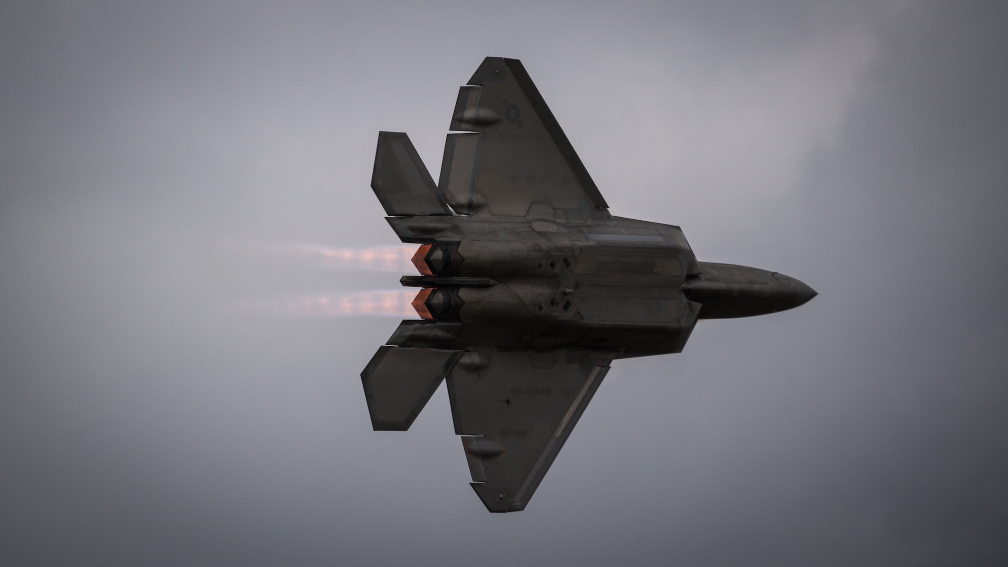 A U.S. Air Force F-22A Raptor performs aerial maneuvers during the 2021 Defenders of Liberty Air & Space Show at Barksdale Air Force Base, Louisiana, May 9, 2021. The Defenders of Liberty air show was first held in 1933 and is a full weekend of military and civilian aircraft, with performances and displays. (U.S. Air Force photo by Senior Airman Max Miller)