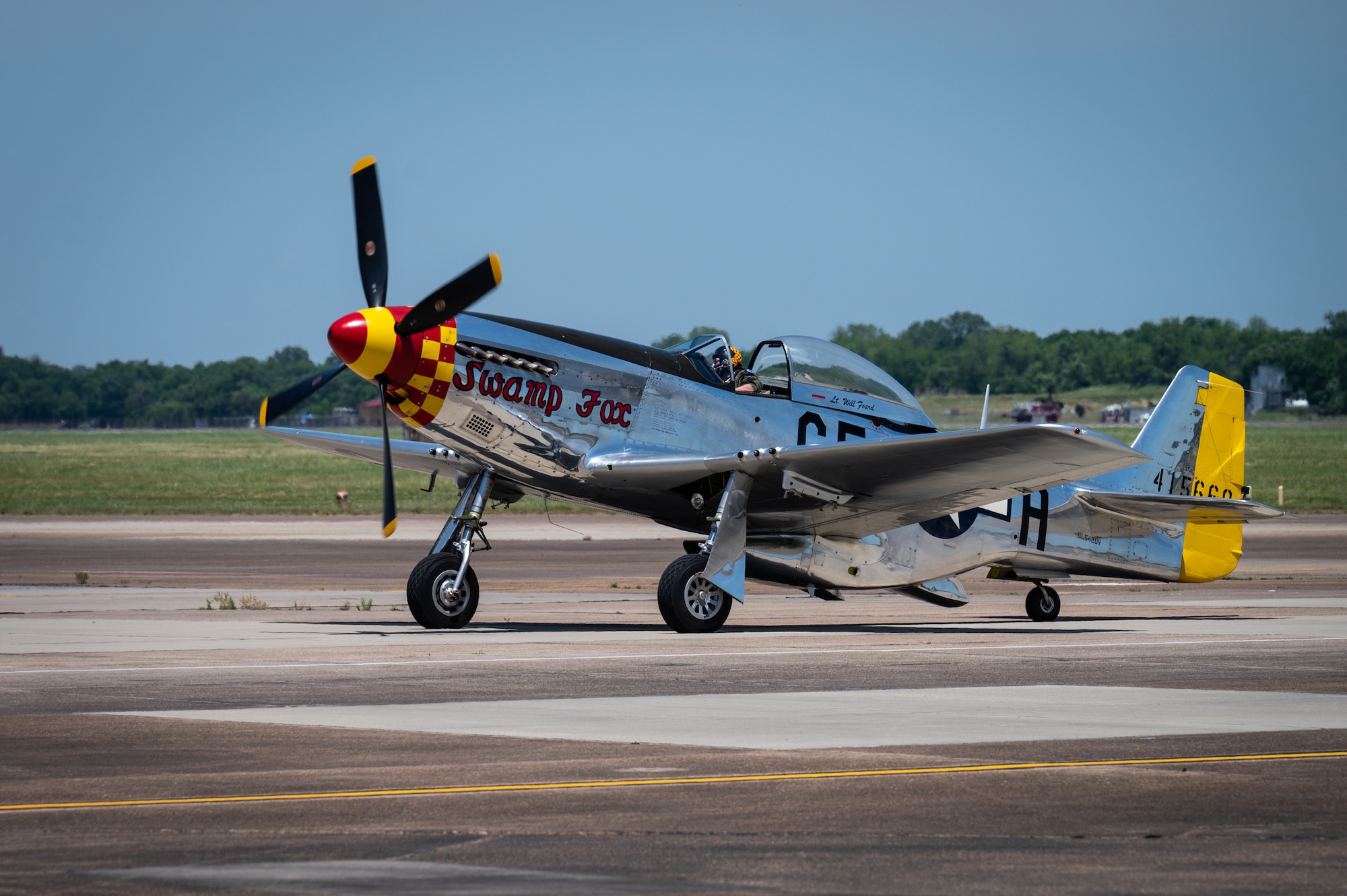 “Swamp Fox,” a P-51 Mustang that was once assigned to the Kentucky Air National Guard, lands after its performance at the Barksdale Defenders of Liberty Air & Space show at Barksdale Air Force Base, Louisiana, May 8, 2021. The Mustang was the primary airframe from its inception in 1947 until 1953. (U.S. Air Force photo by Airman 1st Class Chase Sullivan)