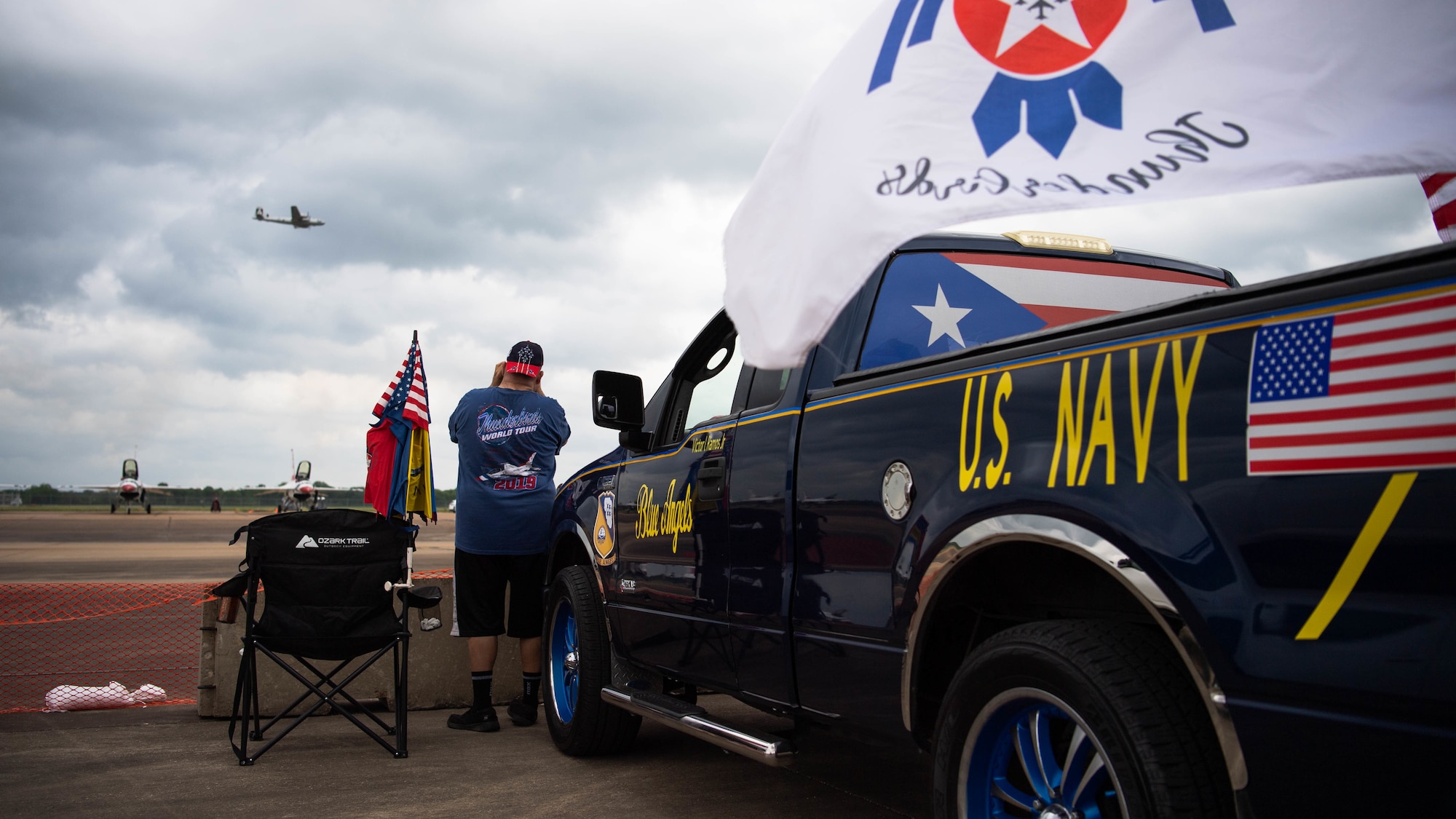 Spectators watch the 2021 Defenders of Liberty Air & Space Show at Barksdale Air Force Base, Louisiana, May 9, 2021. The Barksdale Air Show was a full weekend of military and civilian aircraft performances.  (U.S. Air Force photo by Senior Airman Jacob B. Wrightsman)