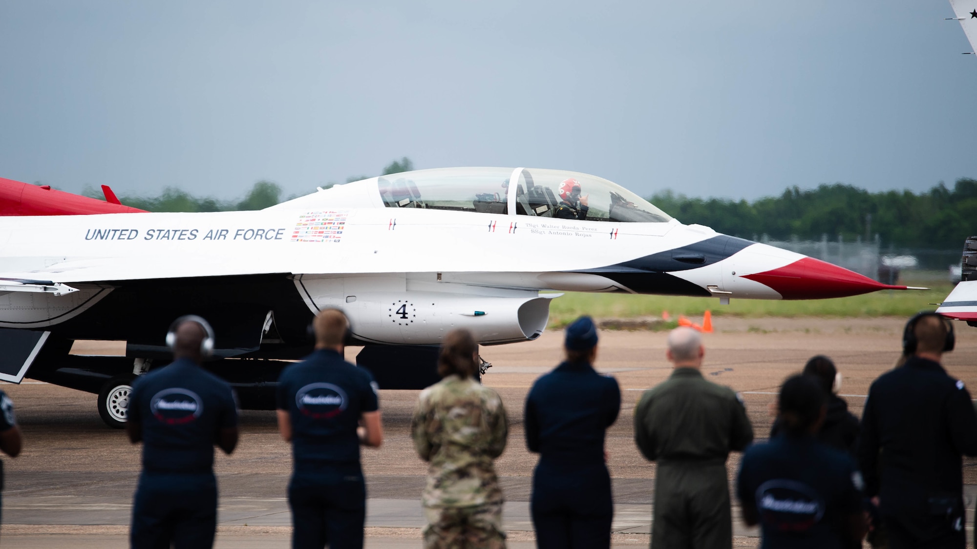 Maj. Michael Brewer, United States Air Force Air Demonstration Squadron, “Thunderbirds,” pilot, waves to spectators during the 2021 Defenders of Liberty Air & Space Show at Barksdale Air Force Base, Louisiana, May 9, 2021. Barksdale's Air Show showcased performances from the Thunderbirds, F-22 Raptor Demonstration Team and a host of additional acts. (U.S. Air Force photo by Senior Airman Jacob B. Wrightsman)