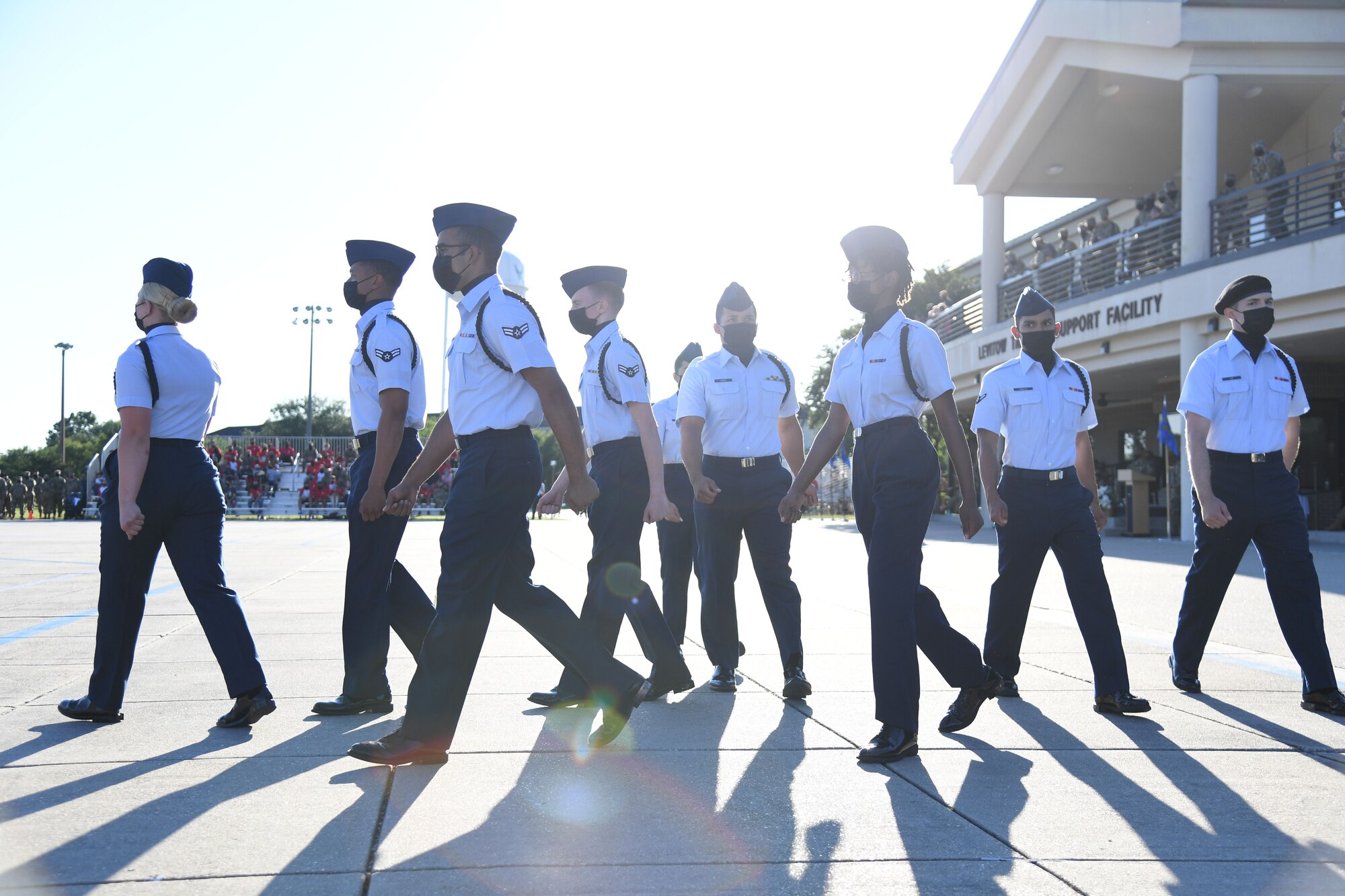 Members of the 338th Training Squadron regulation drill team performs during the 81st Training Group drill down on the Levitow Training Support Facility drill pad at Keesler Air Force Base, Mississippi, May 6, 2021. Airmen from the 81st TRG competed in a quarterly open ranks inspection, regulation drill routine and freestyle drill routine. While in training, Airmen are given the opportunity to volunteer to learn and execute drill down routines. (U.S. Air Force photo by Kemberly Groue)