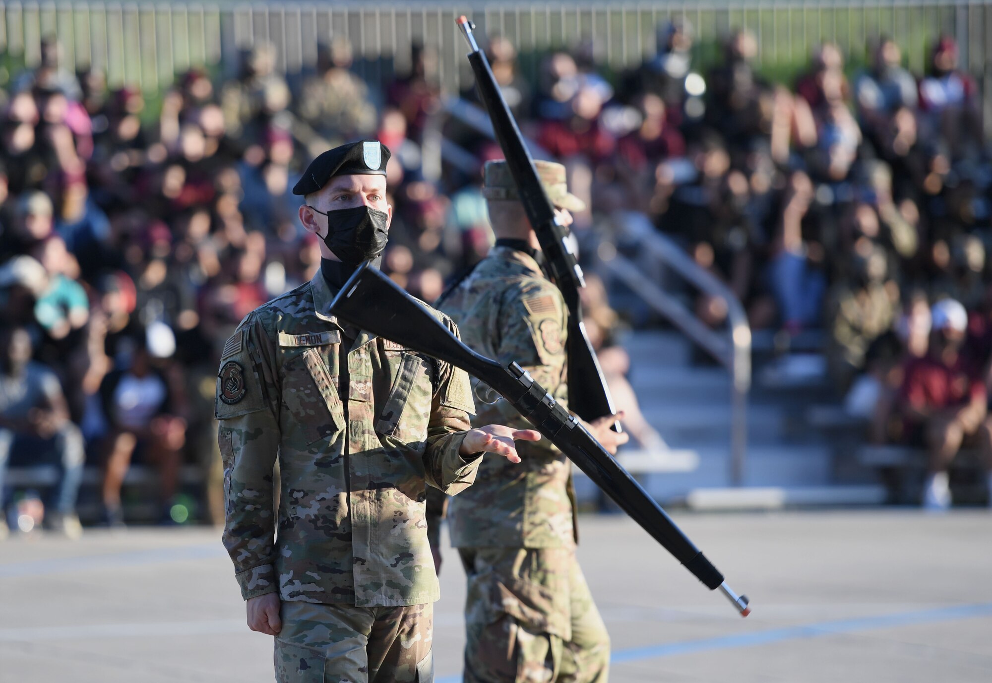 U.S. Air Force Airman 1st Class Zachery Lemon, 338th Training Squadron freestyle drill team member, performs during the 81st Training Group drill down on the Levitow Training Support Facility drill pad at Keesler Air Force Base, Mississippi, May 6, 2021. Airmen from the 81st TRG competed in a quarterly open ranks inspection, regulation drill routine and freestyle drill routine. While in training, Airmen are given the opportunity to volunteer to learn and execute drill down routines. (U.S. Air Force photo by Kemberly Groue)