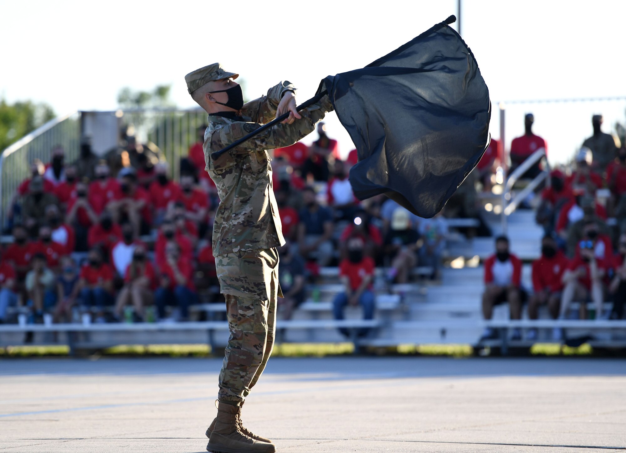 U.S. Air Force Airman Calvin Ledford, 338th Training Squadron freestyle drill team member, performs during the 81st Training Group drill down on the Levitow Training Support Facility drill pad at Keesler Air Force Base, Mississippi, May 6, 2021. Airmen from the 81st TRG competed in a quarterly open ranks inspection, regulation drill routine and freestyle drill routine. While in training, Airmen are given the opportunity to volunteer to learn and execute drill down routines. (U.S. Air Force photo by Kemberly Groue)