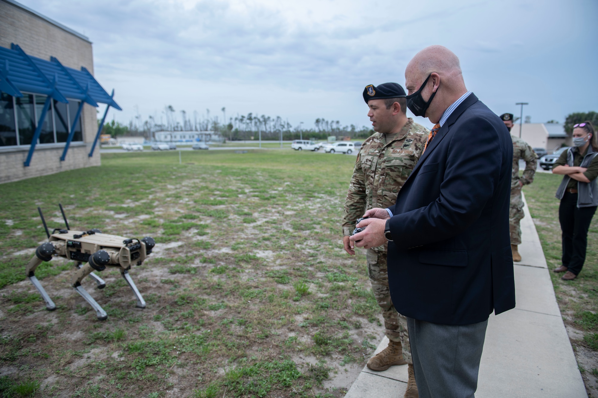 Man operates an unmanned ground vehicle