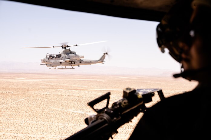 A U.S. Marine AH-1W Super Cobra attack helicopter with Marine Light Attack Helicopter Squadron 269, Marine Aircraft Group 29, 2nd Marine Aircraft Wing, conducts a flight mission during Marine Air Ground Task Force Warfighting Exercise at Marine Corps Air Ground Combat Center, Twentynine Palms, Calif., May 6, 2021. The purpose of MWX is to create a challenging, realistic training environment that puts exercise forces against a thinking opponent in an unscripted, force-on-force wargame that produces combat-ready focus capable of operating as an integrated Marine Air Ground Task Force.