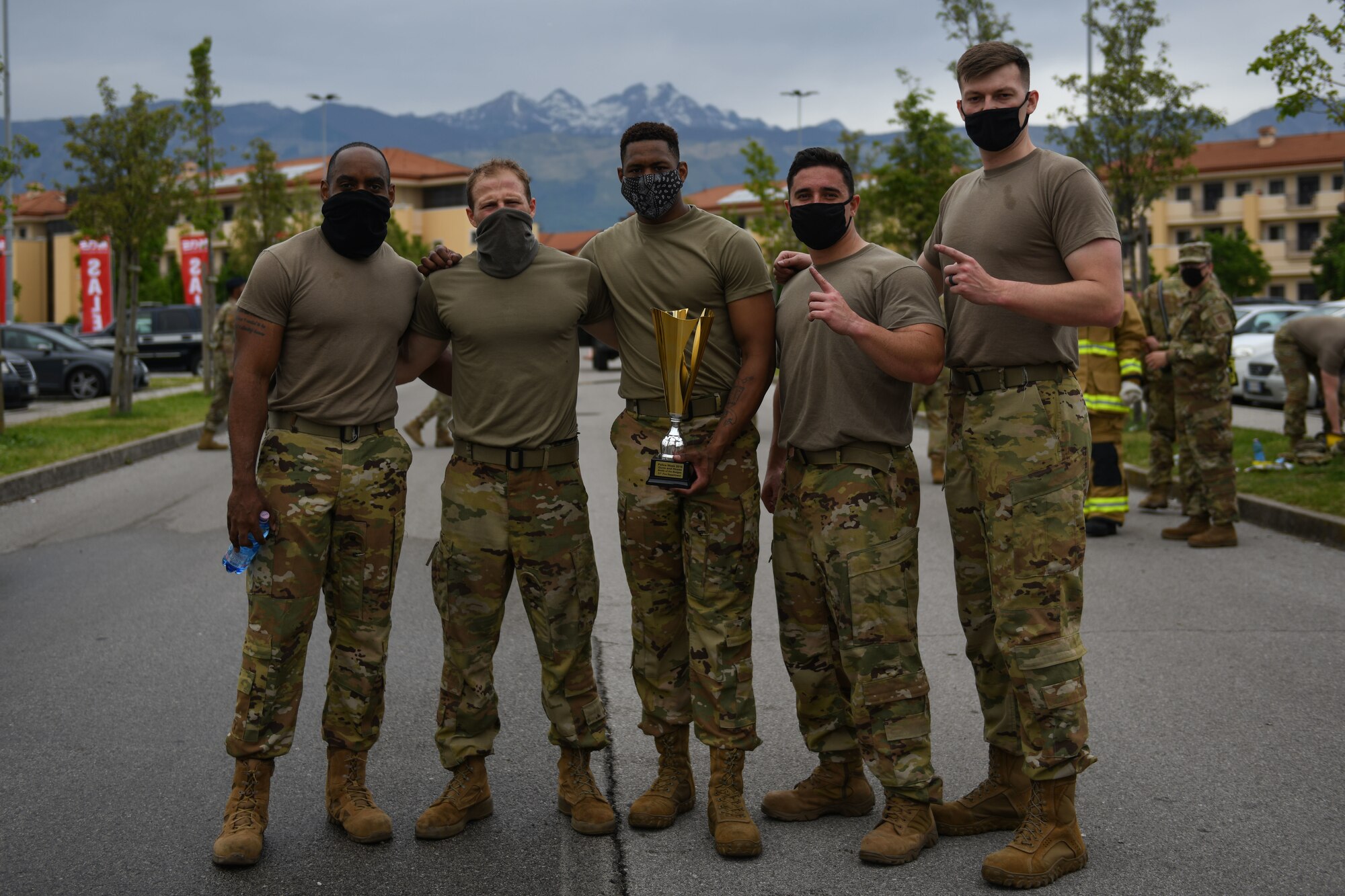 Airmen from the 31st Civil Engineer Squadron (CES) won first place in a “Guns and Hoses” competition during Police Week at Aviano Air Base, Italy, May 11, 2021. The 31st CES team won with the best time of 13 minutes, 1 second. The competition consisted of a hose drag, litter carry, body drag, tire flips, Keiser FORCE Machine, sprints, M4 carbine assembly and disassembly, and a Humvee team push. (U.S. Air Force photo by Senior Airman Ericka A. Woolever)