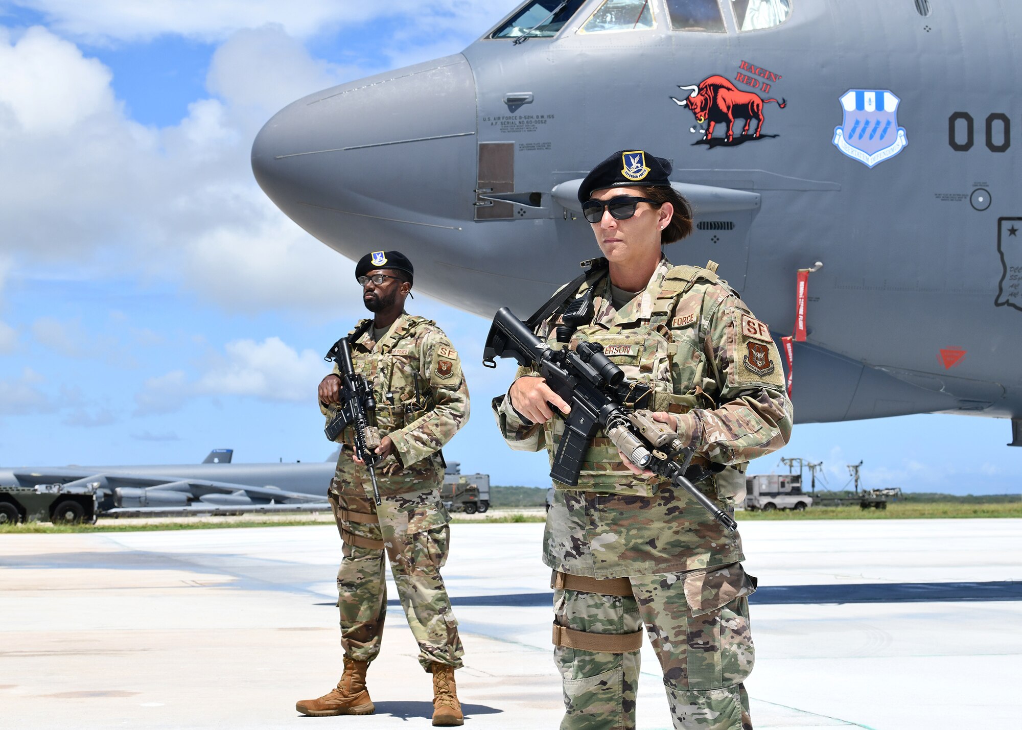 Photo of Airmen guarding a B-52