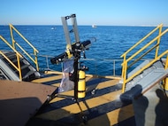 A standard, off-the-shelf, t-shirt cannon is used to shoot out the device for non-lethal stoppage of water jet propelled craft.