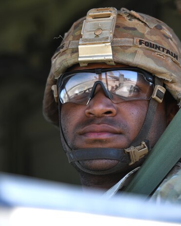 person looks out to flight line