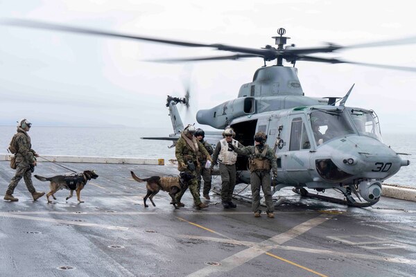 Marines board a U.S. Marine Corps UH-1Y Venom helicopter aboard USS Somerset (LPD 25) during Northern Edge 2021.