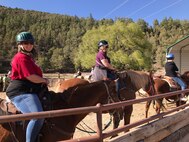 Holloman spouses ride horses during a military spouse appreciation event, May 8-9, at Sacramento Camp and Conference Center, New Mexico.