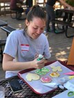 Holloman spouse decorates cookies, May 8-9, at Sacramento Camp and Conference Center, New Mexico.