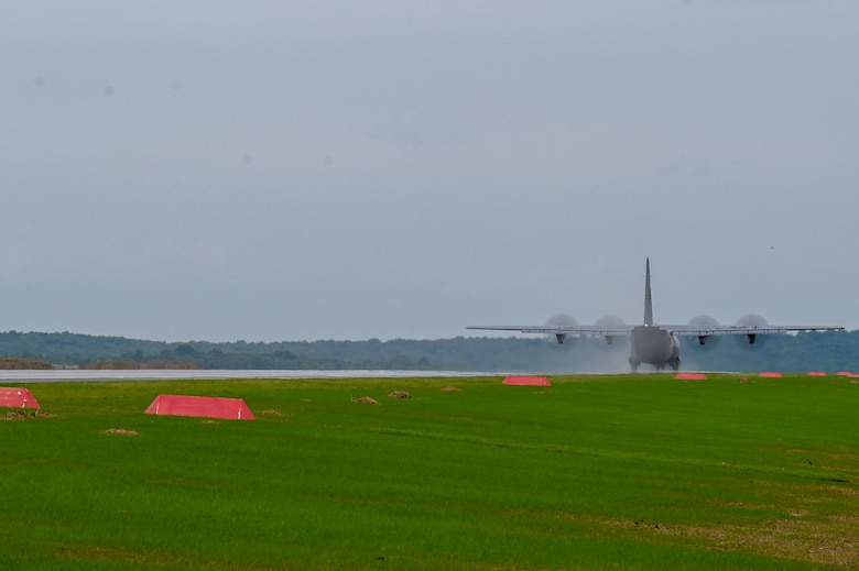 A C-130J lands on an assault landing zone