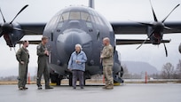 Alaska City of Palmer Mayor Edna DeVries presented the 176th Wing, Alaska Air National Guard with a key to the city on May 7. This token of trust and honor was received Capt. Matt Seakup, Capt. Chris Brunner and Chief Master Sgt. Andy Reynolds from the 211th Rescue Squadron after they landed an HC-130J Combat King II at the Palmer Municipal Airport for the 2021 Great Alaska Aviation Gathering. (U.S. Air Force photo by Dana Rosso)