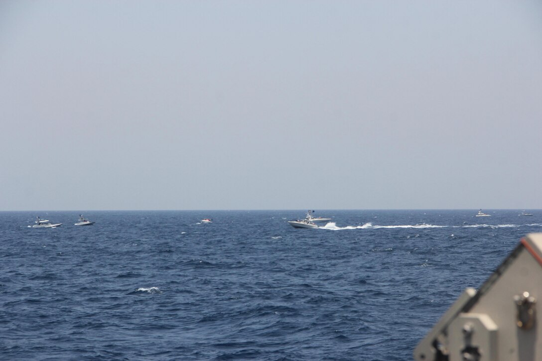 STRAIT OF HORMUZ (May 10, 2021) Two Iranian Islamic Revolutionary Guard Corps Navy (IRGCN) fast in-shore attack craft (FIAC), a type of speedboat armed with machine guns, conducted unsafe and unprofessional maneuvers while operating in close proximity to U.S. naval vessels transiting the Strait of Hormuz, May 10.  U.S. forces exercised lawful defensive measure after the IRGCN vessels ignored repeated verbal and acoustic warning and closed toward Maui at a high speed and close distance with weapons uncovered and manned. (U.S. Navy photo)