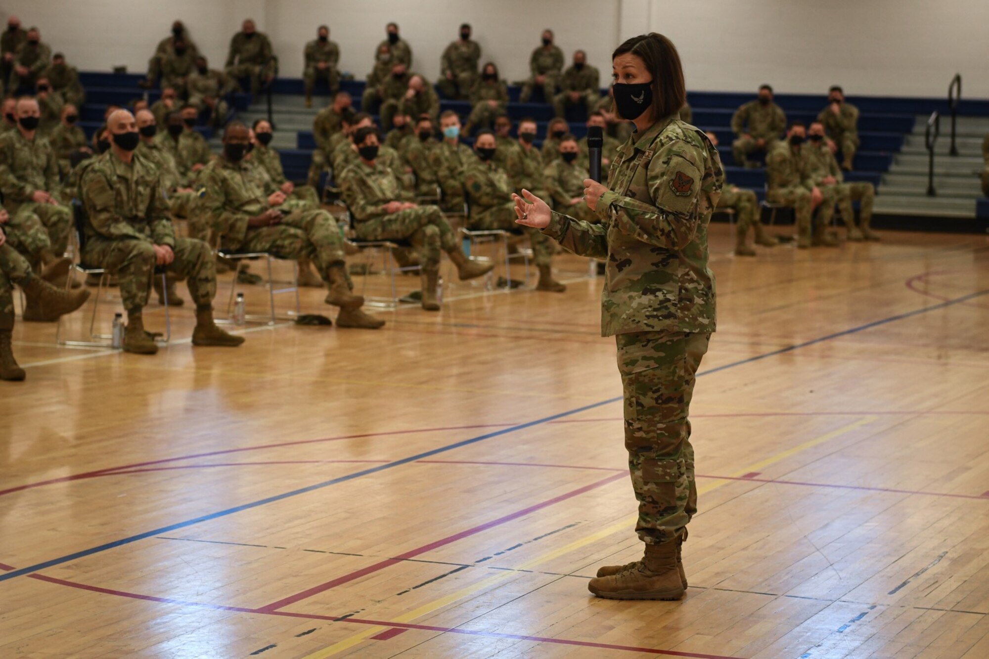 Chief Master Sgt. of the Air Force JoAnne S. Bass addresses enlisted members of Team Buckley during an Enlisted All-call at Buckley Air Force Base, Colo., May 7, 2021.