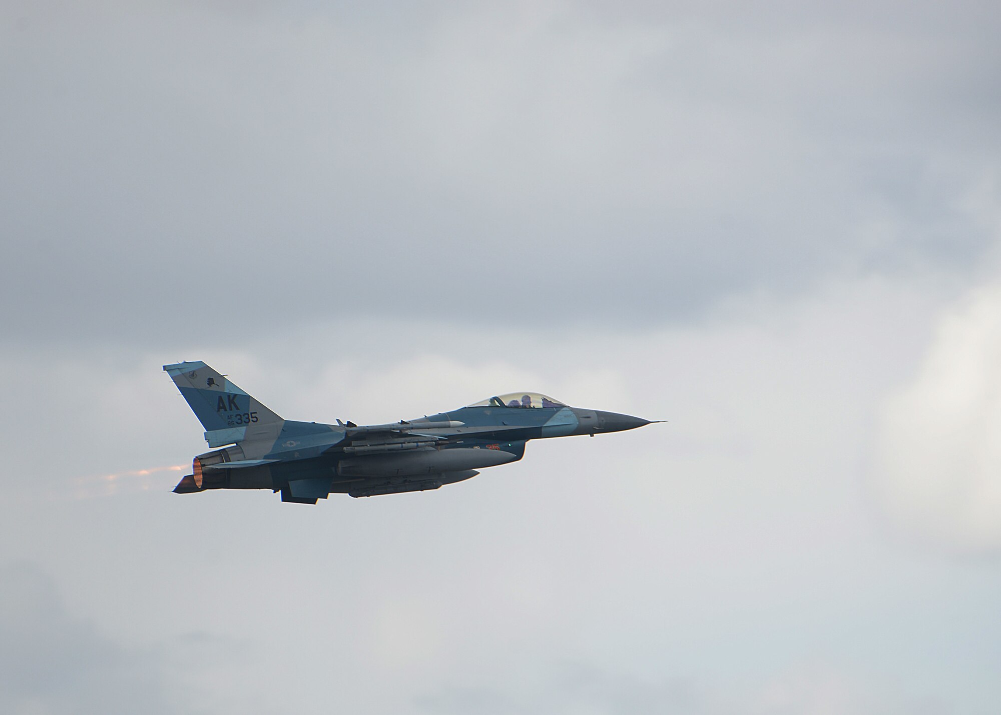 A U.S. Air Force F-16 Fighting Falcos assigned to the 18th Aggressor Squadron take off May 6, 2021, at Eielson Air Force Base, Alaska, in support  of flight operations above the Joint Pacific Alaska Range Complex and Gulf of Alaska during Exercise Northern Edge 2021 (NE21). Navy, Air Force and Marine aircraft executed flight missions during NE21 demonstrating seamless, joint combat capabilities during NE21. Approximately 15,000 U.S. service members are participating in the joint training exercise hosted by U.S. Pacific Air Forces May 3-14, 2021. NE21 is one in a series of U.S. Indo-Pacific Command exercises designed to sharpen the joint forces' skills; to practice tactics, techniques, and procedures; to improve command, control and communication relationships; and to develop cooperative plans and programs. (U.S. Air Force photo by Senior Airman Beaux Hebert)