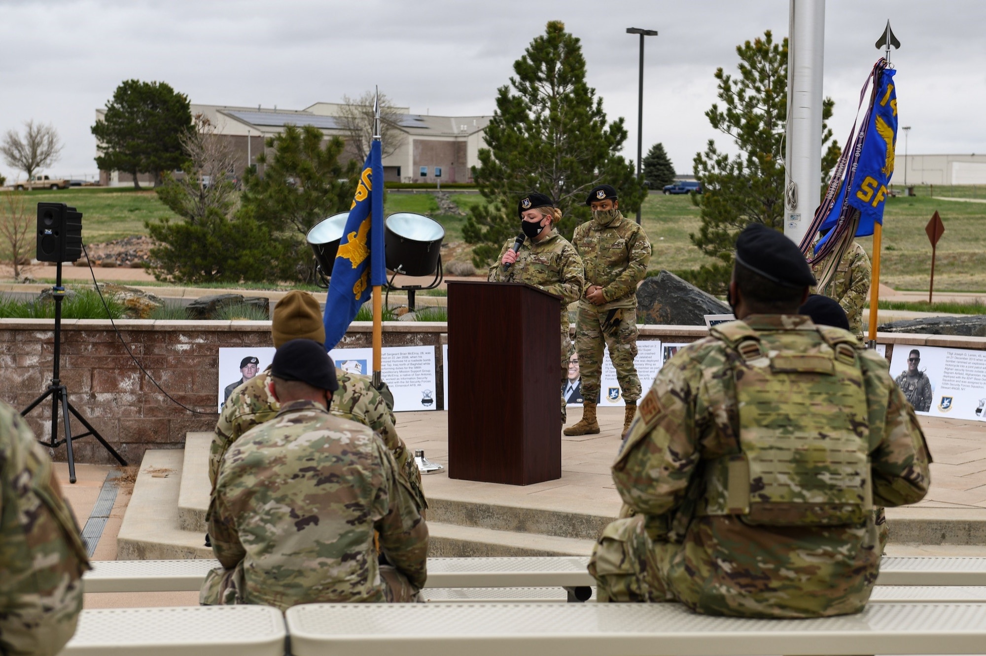 Staff Sgt. Delaney Timchak, a defender for the 460th Security Forces Squadron, welcomes the crowd during a Police Week opening ceremony on Buckley Air Force Base Colo., May 10, 2021.